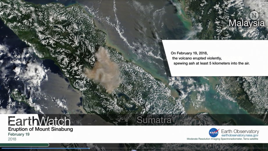 Screenshot of a video called "EarthWatch: Eruption of Mount Sinabung" showing a satellite image of an erupting volcano