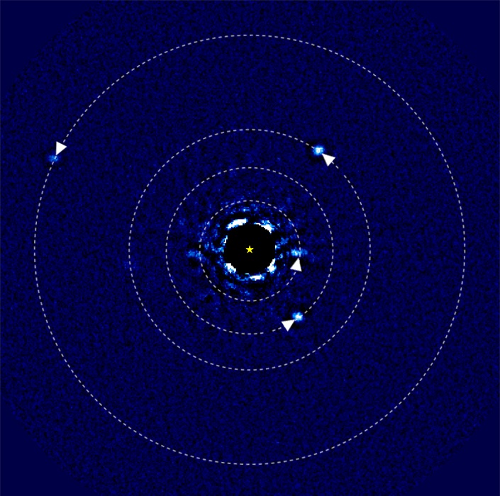 Circular orbits overlaid over four bright spots around disk