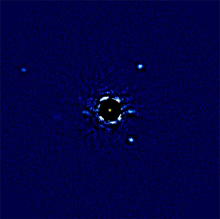 Circular orbits overlaid over four bright spots around disk