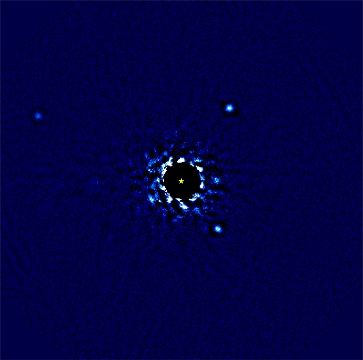 Four spots continue to orbit around disk