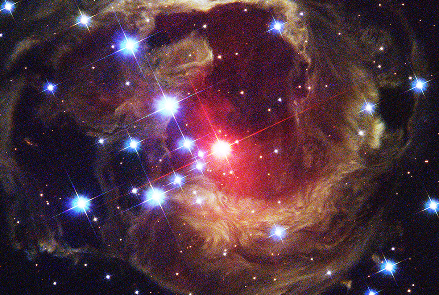 Central star and diffuse surrounding stars against dust