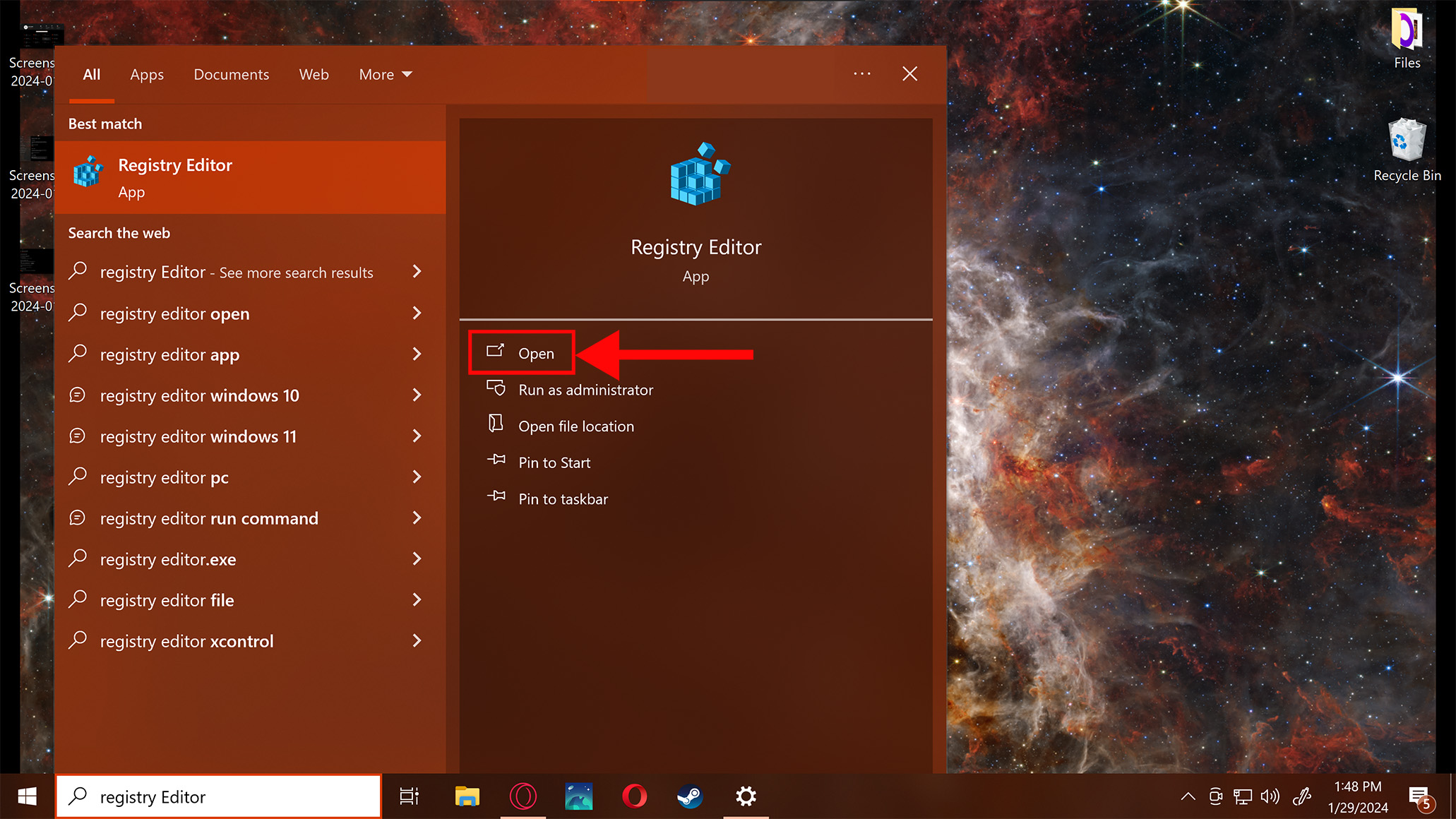Screenshot of the Windows home screen. In the bottom left, the search box has text that reads “Registry Editor.” A pop-up window with results is shown on the left, and the Registry Editor app is shown on the right. A large red arrow points to the “Open” option that is highlighted by a red rectangle.
