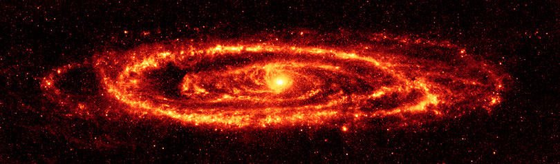 As each slider bar is manipulated, the view transitions from visible light to infrared light. In visible light: This is the classic visible view of the Andromeda Galaxy. In infrared light: Andromeda's dust rings stand out in the infrared.