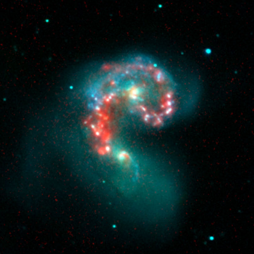 As each slider bar is manipulated, the view transitions from visible light to infrared light. In visible light: These two galaxies have been merging for 800 million years. In infrared light: The addition of infrared highlights dusty regions where stars are forming.