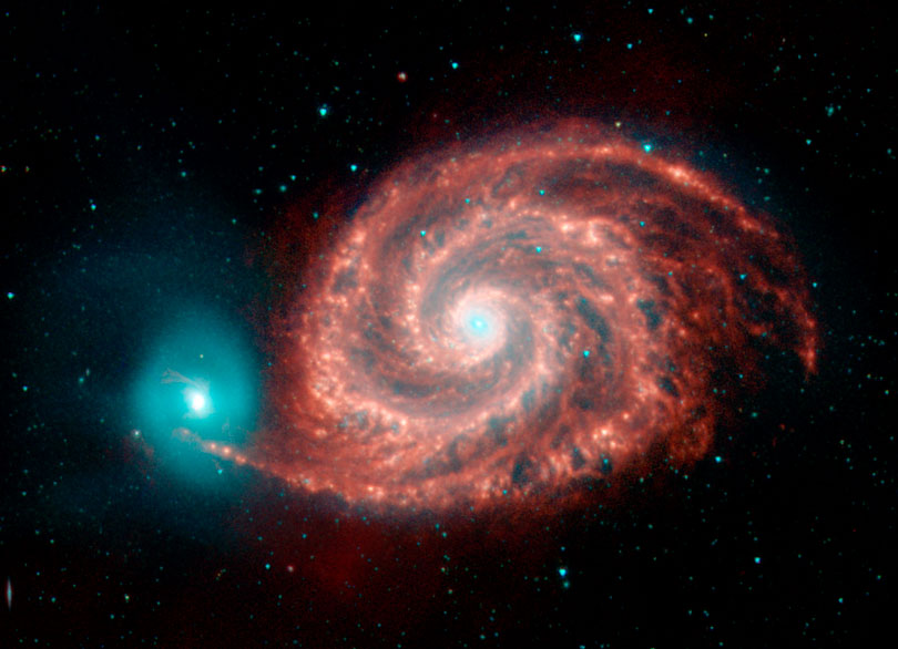 As each slider bar is manipulated, the view transitions from visible light to infrared light. In visible light: The Whirlpool Galaxy is a spiral interacting with a small companion. In infrared light: The dusty spokes in M51 are easily seen in infrared light.