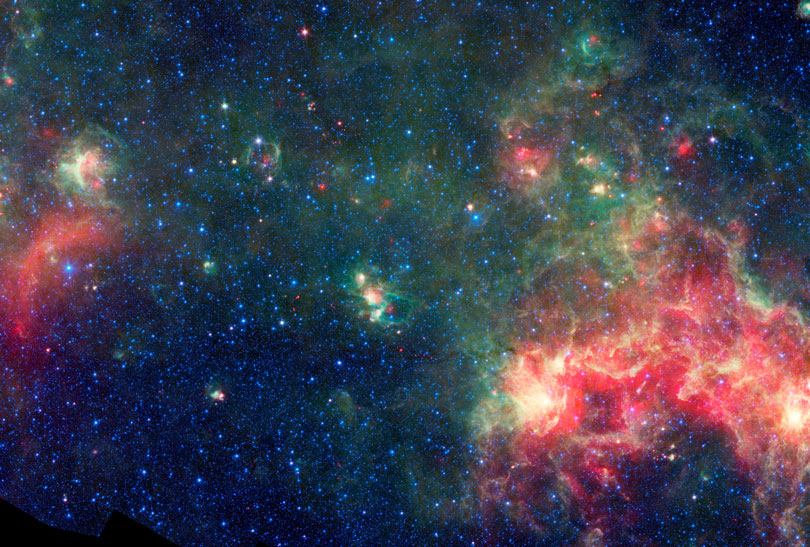 As each slider bar is manipulated, the view transitions from mid infrared light to far infrared light. In mid infrared light: Stars and dust glow alike as we peer deep into the Milky Way in mid-infrared light. In far infrared light: Extending to the far-infrared spectrum, we see the hot (blue) and very cold (red) dust in the galaxy.
