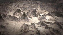 Aerial photo of snow covered mountains and glaciers