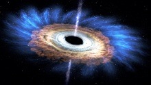 Illustration showing a swirling disk of material around a black circular region at the center, with jets shooting out above and below the center.